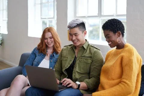 Streaming, break or team in office with laptop, movie binge or multimedia on Stock Photos