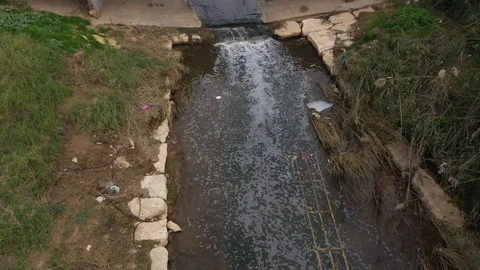 Streaming canal under bridge Stock Footage 125911096