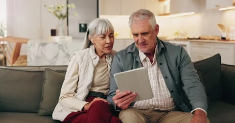 Streaming, happy or old couple in home with tablet, scroll or search for digital Stock Footage 339139478