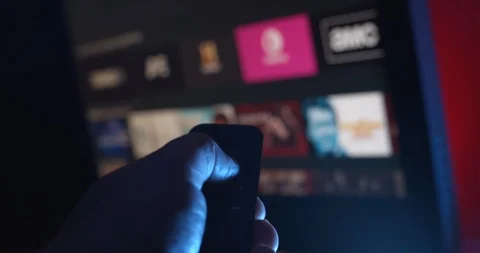 Streaming Media interface. Using Remote to scan content of online library. Vídeo Stock 123497929