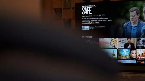 Streaming Netflix On TV Set Stock Footage 91543182