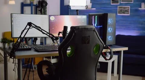 Streaming professsional microphone in empty gaming home studio Stock Photos