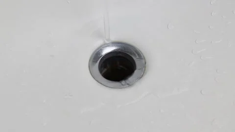 Streaming water in bathroom sink Stock Footage 150042629