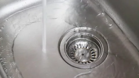 Streaming water in bathroom sink Stock Footage 150042639