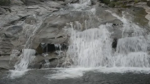 Streaming water  on the rock at small waterfall in  Thailand Stock Footage