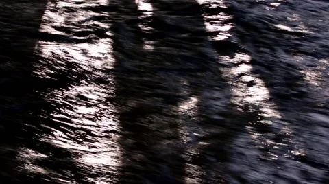 Streaming water with shadows formed by trees Stock Footage 68727126