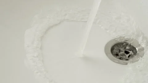 Streaming water in sink, close-up. Stock Footage 263821152