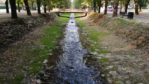 Streamlet a small river in the city Vrnjacka Banja Serbia Aerial Stock Footage 97725131