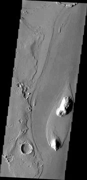 The streamlined island in this image captured by NASA's 2001 Mars Odyssey s.. Stock Photos