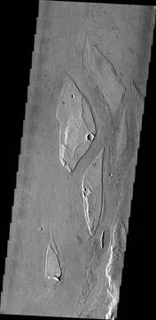 The streamlined islands in this image from NASA s 2001 Mars Odyssey spacec... Stock Photos