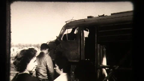 Streamlined Train Engine Wreck with Automobile on Railroad Tracks Stock Footage 130385739