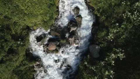 Streams and Rivers in the Valley originating from Melting Snow Stock Footage 248376903