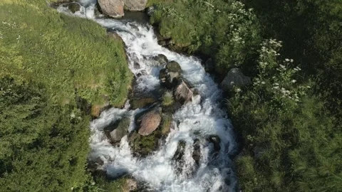 Streams and Rivers in the Valley originating from Melting Snow Stock Footage 248376943