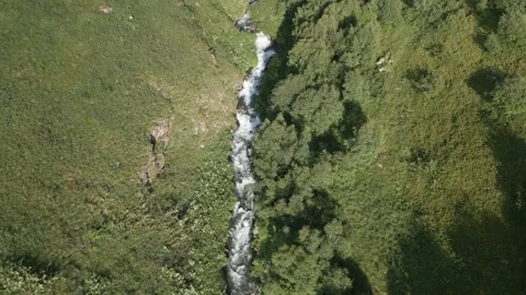 Streams and Rivers in the Valley originating from Melting Snow Stock Footage 248376994