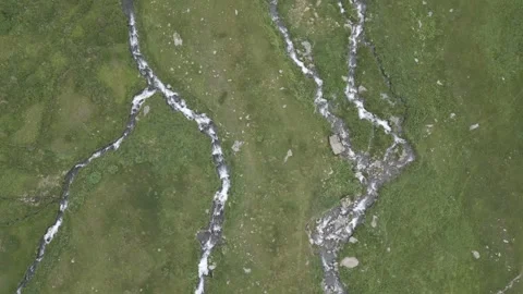 Streams and Rivers in the Valley originating from Melting Snow Stock Footage 248377003