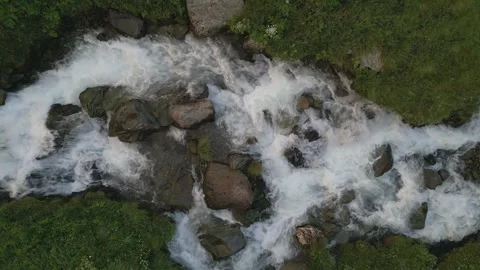 Streams and Rivers in the Valley originating from Melting Snow Stock Footage 248377059
