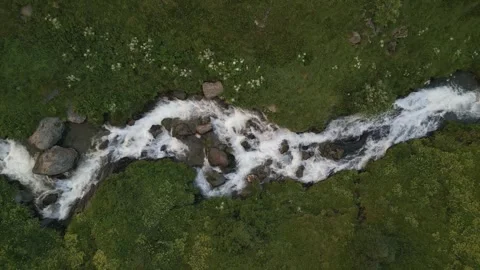 Streams and Rivers in the Valley originating from Melting Snow Stock Footage 248377060