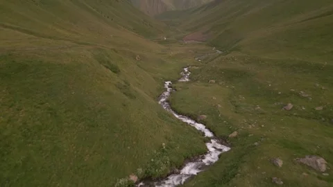 Streams and Rivers in the Valley originating from Melting Snow Stock Footage 248377796