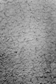 The streams of gray paint on the wall closeup. Stock Photos