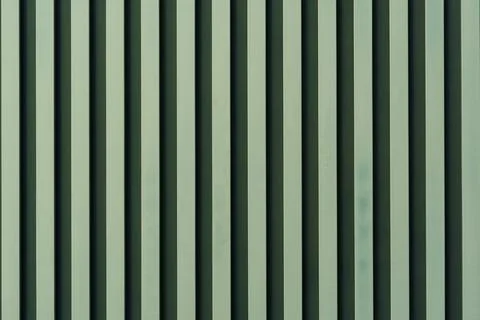 Streams on a light surface. A background with strips from green color.   ve.. Stock Photos