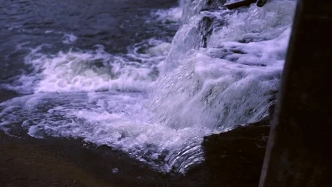 Streams of water flow over the rocks Stock Footage 107424474