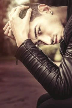 Strees young man with problems. Handsome man with his hands on his head. Anxi Stock Photos