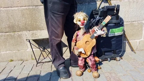 Street actor controls puppet on Charles Bridge Stock Footage 113302509
