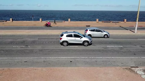 Street aerial side view of rambla promenade of Montevideo, Uruguay Stock Footage 213978507
