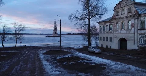 Street and view of the bell tower at dusk Stock Footage 73820103