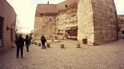 Street around ancient Defensive wall of citadel Hisar Fountain tourists Ankara Stock Footage 77872458