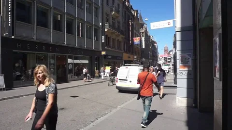 Street in Basel Schweiz, people walking Stock Footage