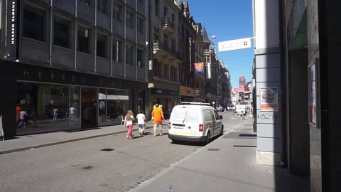 Street in Basel Schweiz, people walking Stock Footage