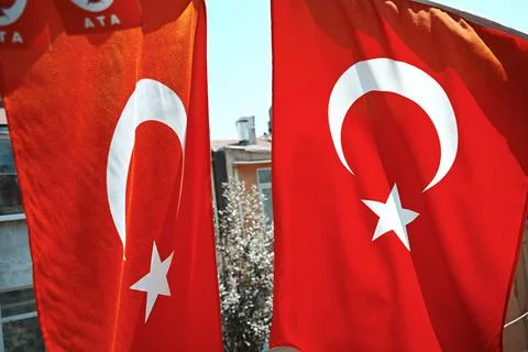 Street between two flags on the balcony 스톡 사진