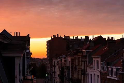 Street in Brussels in sunset light Stock Photos