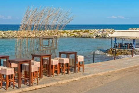 Street cafe on seafront Stock Photos