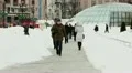 Street city scene with people in the winter. Editorial HD Footage