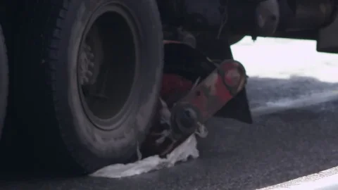 Street cleaning machine rides down the street in slow motion Stock-Footage 75443379