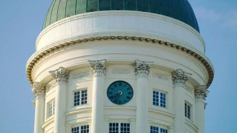 Street clock on a cylindrical structure Stock Photos