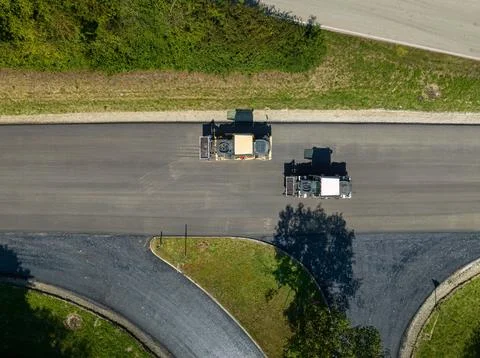 Street construction aera with two rollers from above, aerial shot Stock Photos