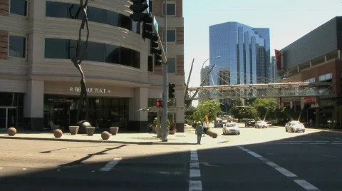 Street corner people walking Stock Footage