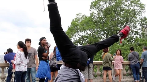 Street dancer performing hand stands Stock Footage 78505578