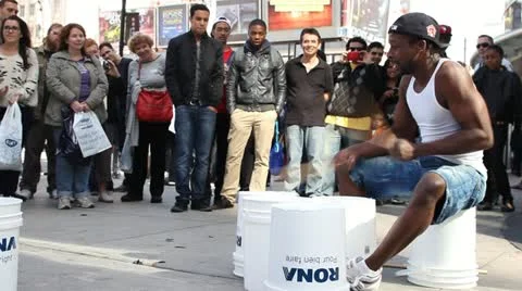 Street drummer performing Stock Footage 12174024