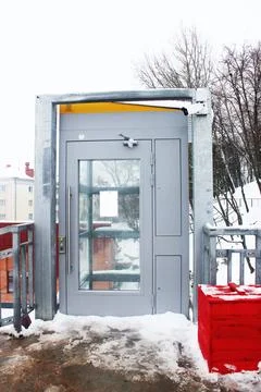 Street elevator cabin in winter 库存照片