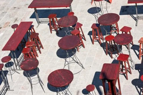 Street empty cafe near old town in the morning. Budva, Montenegro Stock Photos