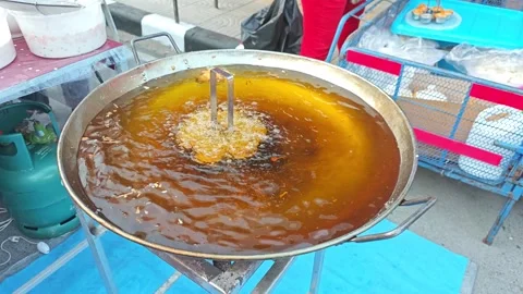 Street Food Deep Frying Process in Large Wok. Stock Footage 340549475