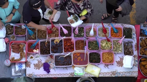 Street food seller preparing traditional... | Stock Video | Pond5