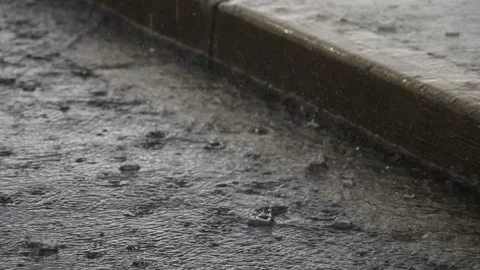 Street gutter and kerb stone during heavy rain Video stock 152347894