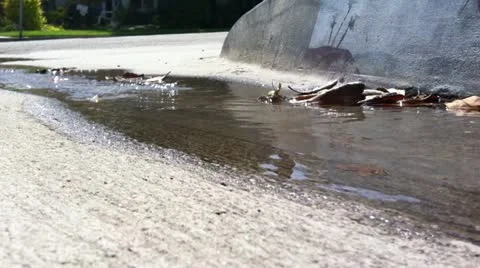 Street Gutter Stream Stock Footage 10962013