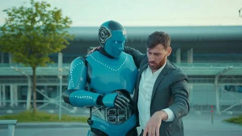 On street humanoid robot walk help to a drunken friend man in the city future Stock Footage 133308606