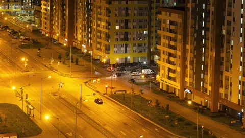 Street intersection in the city, timelapse at night from above busy traffic Stock Footage 280109217